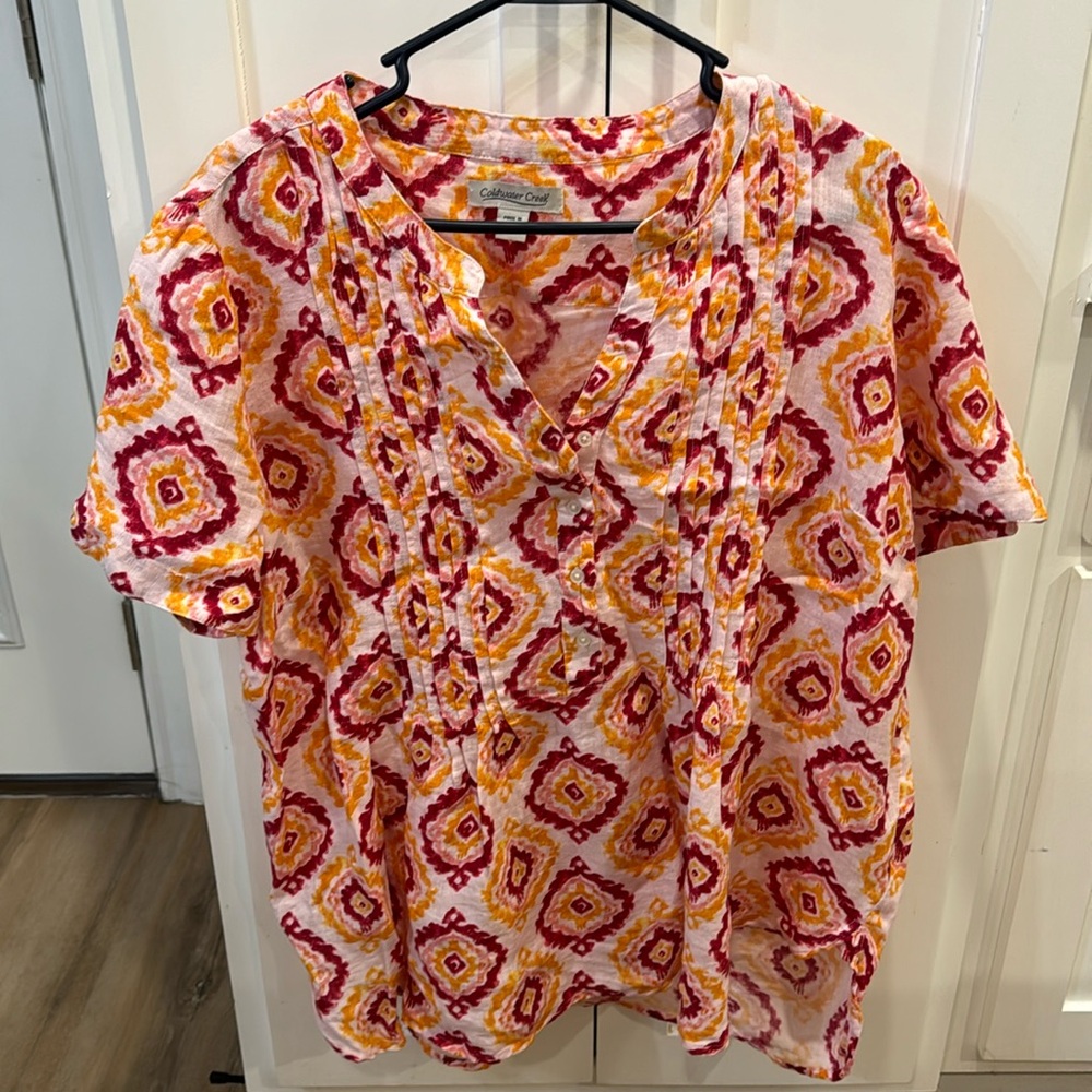 Women’s size 1x. PTP is 25.5” and length is 27”.